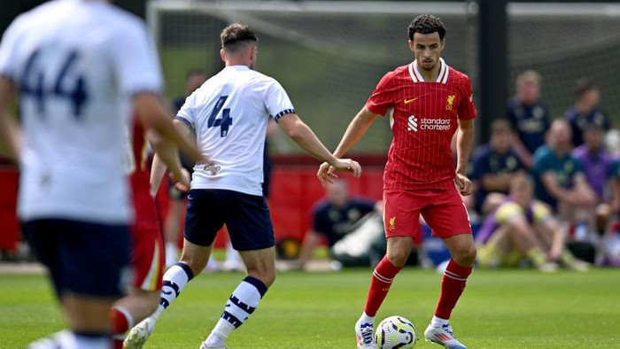 Curtis Jones nyaman di bawah asuhan Arne Slot (Liverpool FC via Getty Images/Andrew Powell)